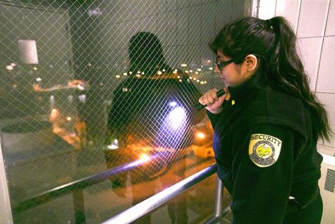 Then-UI sophomore Daisy Torres patrols as a student security officer for the UI police on early Saturday morning, Feb. 18, 2017. 