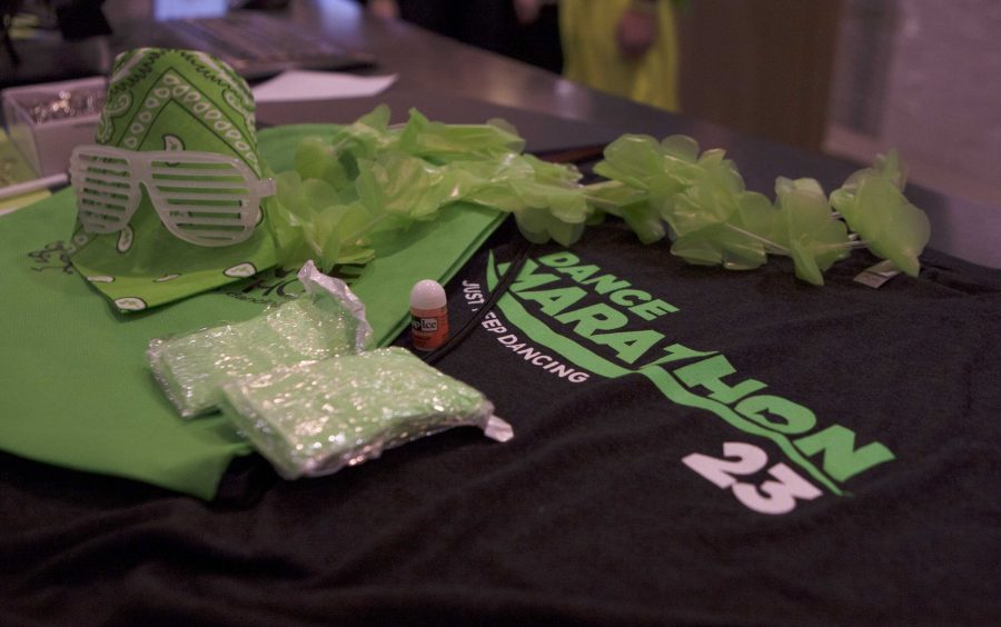 Items in the Dance Marathon swag bag sits on a table during the 7th hour of the 23rd Dance Marathon at the Iowa Memorial Union on Saturday, Feb. 4, 2017. (The Daily Iowan/Courtney Hawkin) 
