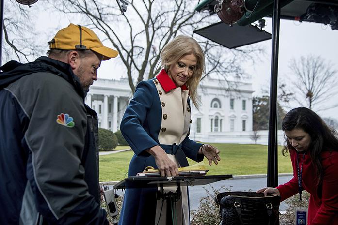 President Donald Trumps adviser Kellyanne Conway gets ready to go on television outside the White House, Sunday, Jan. 22, 2017, in Washington. (AP Photo/Manuel Balce Ceneta)