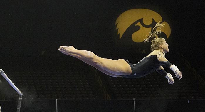 Iowa freshman Charlotte Sullivan dismounts during a women's gymnastics meet in Carver-Hawkeye Arena on Friday, Jan. 13, 2017. The Hawkeyes defeated the Spartans, 195.475-193.875. (The Daily Iowan/Joseph Cress)