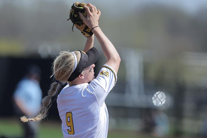 Iowa third baseman Sarah Kurtz catches an infield pop-up during the Iowa-Wisconsin game at Bob Pearl Field on Sunday, April 17, 2016. The Hawkeyes lost to the Badgers, 3-1. (The Daily Iowan/Margaret Kispert)