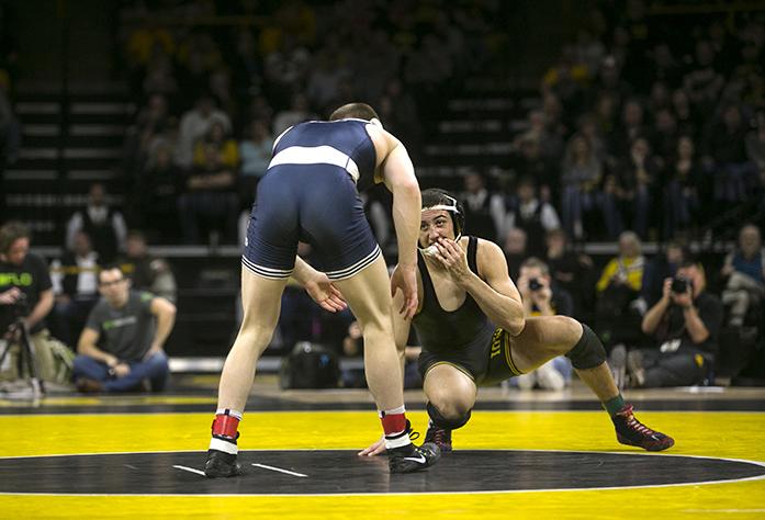 Iowas+157-pounder+Michael+Kemerer+fixes+his+headgear+while+wrestling+Penn+States+Jason+Nolf+during+wrestling+meet+between+Iowa+and+Penn+State+in+Carver-Hawkeye+Arena+on+Friday%2C+Jan.+20%2C+2017.+The+Nittany+Lions+defeated+the+Hawkeyes%2C+26-11.+%28The+Daily+Iowan%2FJoseph+Cress%29