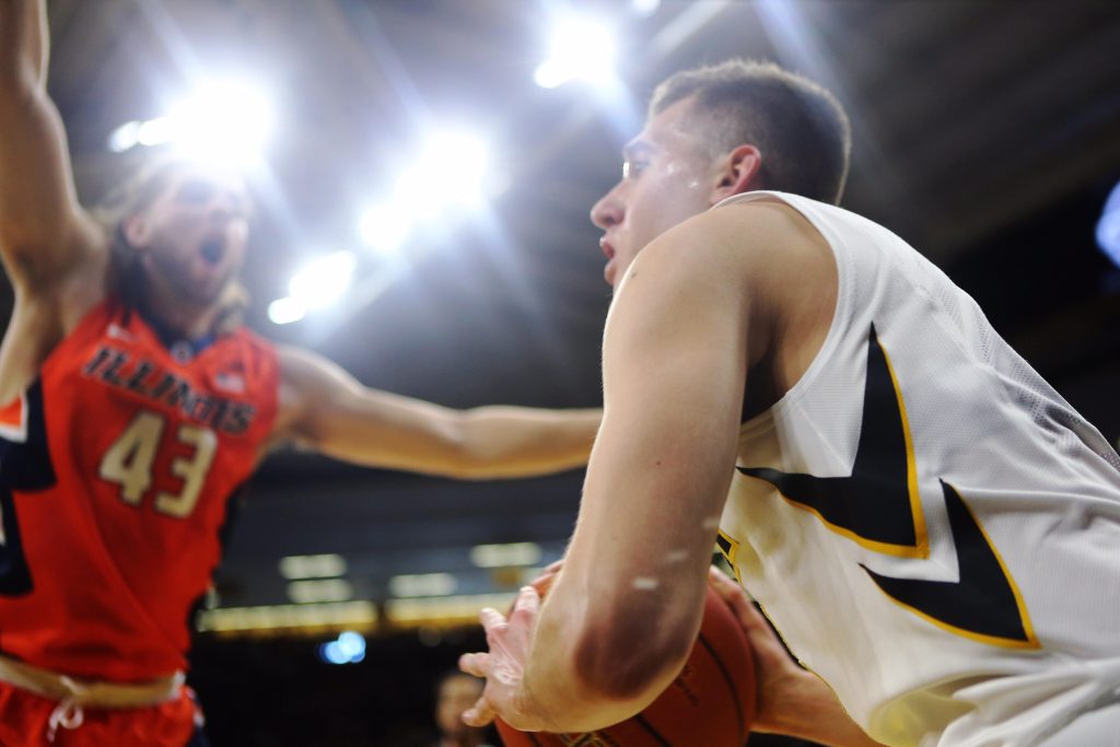 Iowa guard Jordan Bohannon inbounds a ball during a game against Illinois in Carver-Hawkeye Arena on Saturday, Feb. 18, 2017. Illinois defeated the Hawkeyes, 70-66. (The Daily Iowan/Josh Housing)