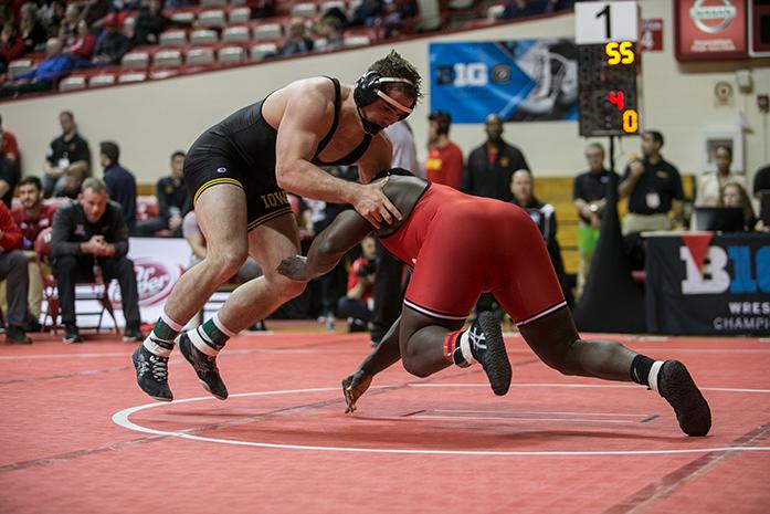 Iowas Steven Holloway avoids a takedown from Rutgers Razohnn Gross during the Big Ten Wrestling Championships in the Simon Skjodt Assembly Hall in Bloomington, Indiana on Saturday, March 4, 2017. Big Ten wrestlers compete for a chance to be named Big Ten Champion of their weight class.(The Daily Iowan/Anthony Vazquez)