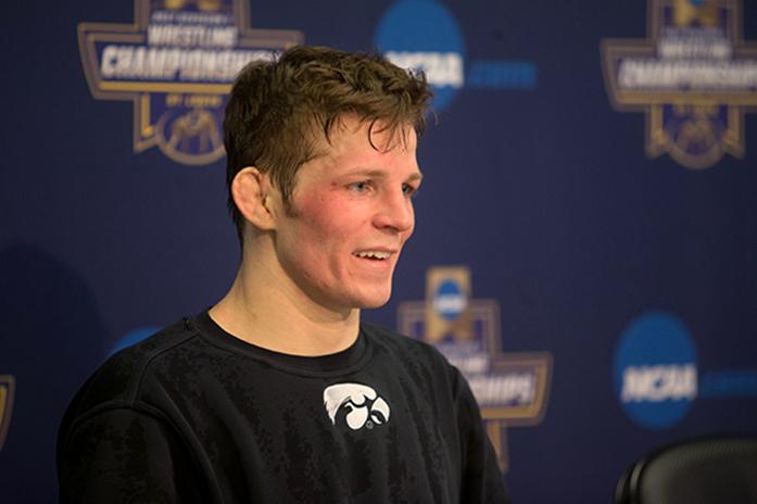 Iowa’s Cory Clark smiles as he talks to the press during the 2017 NCAA Division I Wrestling Championships in the Scottrade Center in St. Louis, Missouri on Saturday, March 18, 2017. Day 3 brought about many surprises and a great wave of new champions. Iowa came in fourth overall with a team score of 97.(The Daily Iowan/Anthony Vazquez)