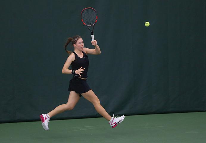 Iowas Anastasia Reimchen hits the ball during the Iowa-Creighton match at the Hawkeye Tennis and Recreation Complex on Saturday, Jan. 21, 2017. The Hawkeyes defeated the Blue Jays, 7-0. (The Daily Iowan/Margaret Kispert)