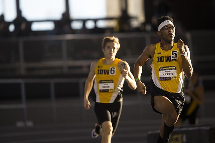 Iowa sophomore Mar'yea Harris, front, and Charles Guier compete during the men's 600 meter during the Border Battle indoor track meet in the UI Recreation Building with Iowa, Missouri and Illinois competing on Saturday, Jan. 7, 2017. The Hawkeye women defeated Missouri and Illinois, 105-33 and 96-51 respectively, while the men defeated Missouri, 107-27 and fell to Illinois, 85-74. (The Daily Iowan/Joseph Cress)