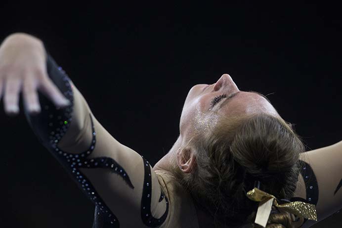 Iowa senior Angel Metcalf during a women's gymnastics meet in Carver-Hawkeye Arena on Friday, Jan. 13, 2017. The Hawkeyes defeated the Spartans, 195.475-193.875. (The Daily Iowan/Joseph Cress)