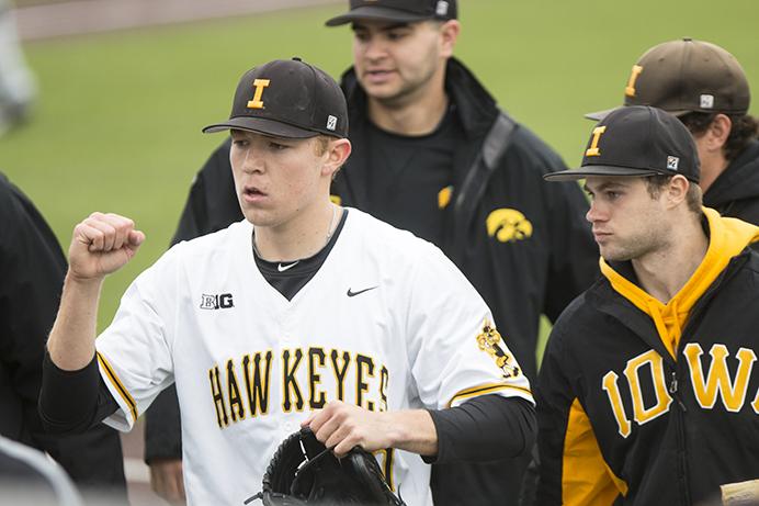 Iowa+pitcher+Nick+Gallagher+bumps+fists+with+teammates+after+an+inning+with+no+runs+during+the+first+of+three+baseball+games+against+UNLV+at+Duane+Banks+Field+on+Friday%2C+March%2C+31%2C+2017.+The+Hawkeyes+defeated+the+Rebels%2C+3-0.+%28The+Daily+Iowan%2FJoseph+Cress%29