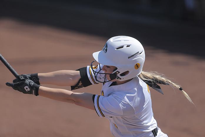 Iowa second baseman Claire Fritsch swings the bat during the Iowa-Wisconsin game at Bob Pearl Field on Sunday, April 17, 2016. The Hawkeyes lost to the Badgers, 3-1. (The Daily Iowan/Margaret Kispert)