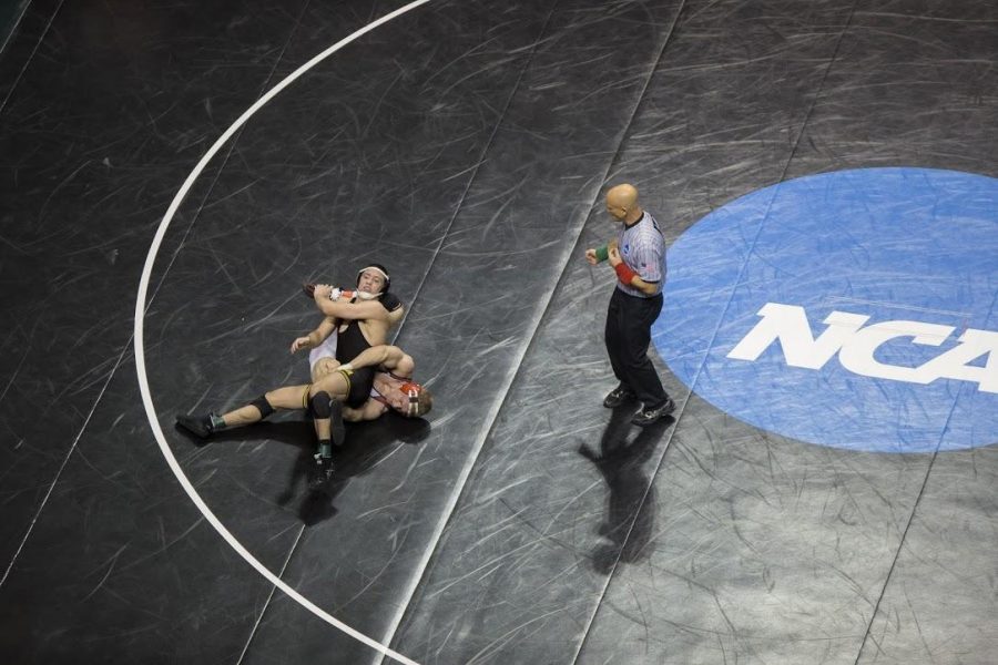 Iowa’s Michael Kemerer tries to maintain control of Indianas Jake Danishek during the 2017 NCAA Division I Wrestling Championships in the Scottrade Center in St. Louis, Missouri on Thursday, March 16, 2017. 330 college wrestlers from around the country compete to named the national champion in their weight class. (The Daily Iowan/Anthony Vazquez)