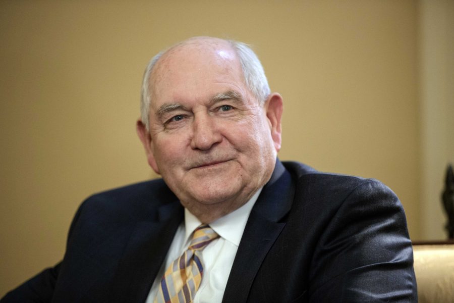 FILE - In this Feb. 1, 2017, file photo, Agriculture Secretary-designate, former Georgia Gov. Sonny Perdue attends a meeting on Capitol Hill in Washington. Perdue says he will step down from several positions at companies bearing his name, restructure family trusts and create blind trusts to avoid a conflict of interest if he is confirmed. (AP Photo/J. Scott Applewhite, File)