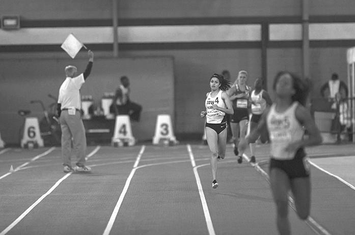 Iowa's Alexis Hernandez follows closely behind fellow teammate Elexis Guster in the Women's 600 Meter Run during the Iowa Dual track and field meet on Saturday, Jan. 16, 2016. Guster took first place with a time of 1:32.04 while Hernandez took second in 1:36.36. (The Daily Iowan/Brooklynn Kascel)