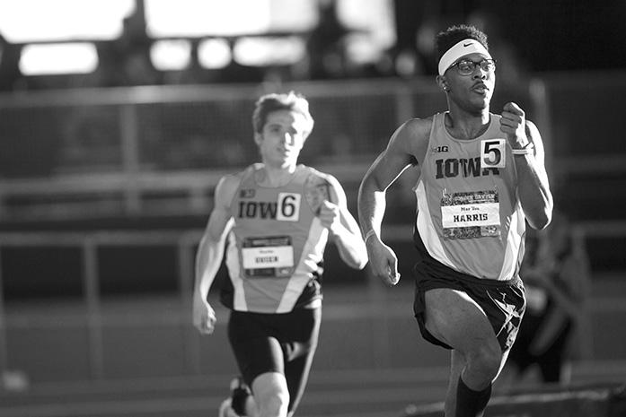 Iowa sophomore Mar'yea Harris, front, and Charles Guier compete during the men's 600 meter during the Border Battle indoor track meet in the UI Recreation Building with Iowa, Missouri and Illinois competing on Saturday, Jan. 7, 2017. The Hawkeye women defeated Missouri and Illinois, 105-33 and 96-51 respectively, while the men defeated Missouri, 107-27 and fell to Illinois, 85-74. (The Daily Iowan/Joseph Cress)