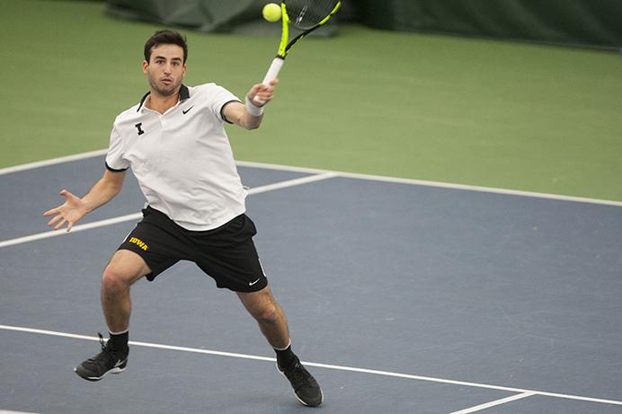 Iowas Josh Silverstein returns a ball during a mens tennis meet against Wisconsin in the Hawkeye Tennis & Recreation Complex on Sunday, March 5, 2017. The Hawkeyes lost to the Badgers, 5-2. (The Daily Iowan/Joseph Cress)