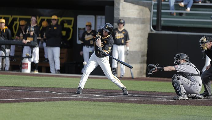 Iowa+outfielder+Robert+Neustrom+makes+contact+at+Duane+Banks+Field+in+Iowa+City+on+Tuesday%2C+March+29%2C+2016.+The+Hawkeyes+bats+came+alive+in+their+12-3+defeat+over+the+Huskies.+%28The+Daily+Iowan%2F+Alex+Kroeze%29