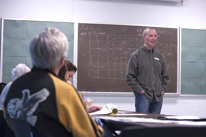 Members of the community gather to hear Fred Meyer instruct on designing the perfect garden at the Design an Ever-Blooming Garden event on Tuesday March 21st, 2017. (The Daily Iowan/Lisa Dauterive)