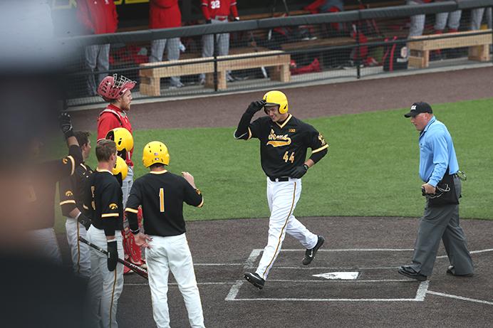Iowa+outfielder+Robert+Neustrom+celebrates+with+teammates+after+his+grand+slam+during+the+game+between+the+Bradley+Braves+and+the+Iowa+Hawkeyes+in+Iowa+City+at+Duane+Banks+Field+on+Wednesday%2C+March+22%2C+2017.+The+Hawkeyes+bats+came+alive+to+hit+two+grand+slams+and+won+12-1.+%28The+Daily+Iowan%2F+Alex+Kroeze%29