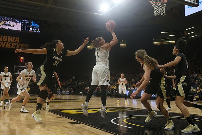 Iowa guard Alexa Kastanek takes a jump shot during the Colorado vs. Iowa meeting in Iowa City at Carver Hawkeye on Thursday, March 23, 2017. The Hawkeyes went on to defeat the Buffaloes 80-62 in the third round of the Women's National Invitation Tournament. (The Daily Iowan/ Alex Kroeze)