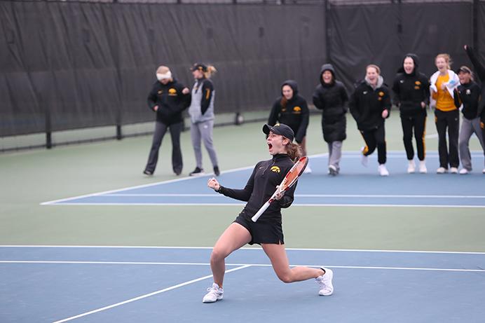 FILE - In this file photo, Iowas Elise Van Heuvelen celebrates a made point during the Iowa-Indiana match at the Hawkeye Tennis and Recreation Complex on Friday, March 31, 2017. The Hawkeyes were defeated by the Hoosiers, 5-2. (The Daily Iowan/Margaret Kispert, file)