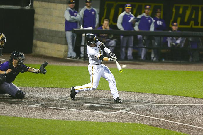 Iowa catcher Tyler Cropley hits the pitch during the game between Western Illinois-Iowa in Iowa City at Duane Banks Field on Tuesday, April 11, 2017. The Hawkeyes defeated the Leathernecks 4-1. (The Daily Iowan/ Alex Kroeze)