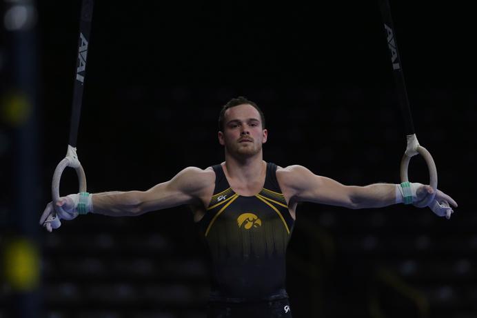 Iowa gymnast Dylan Ellsworth performs on the rings during the Iowa-Nebraska match at Carver-Hawkeye Arena on Monday, March 20, 2017. The Hawkeyes defeated the Huskers, 408.300-400.000. (The Daily Iowan/Margaret Kispert)