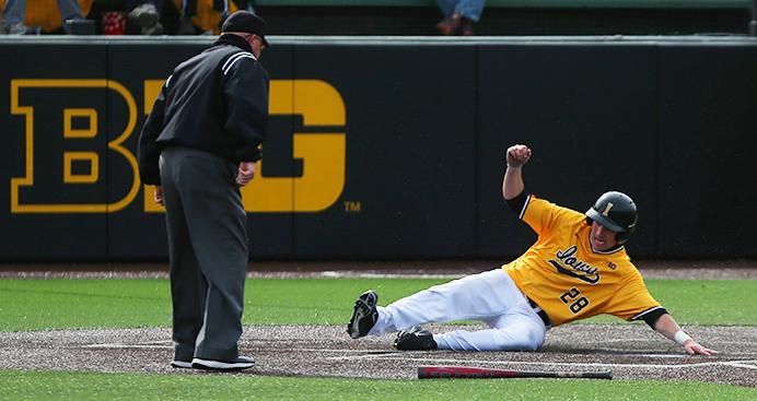 Iowa+infielder+Chris+Whelan+slides+over+home+plate+for+the+Hawkeyes+first+run+during+the+Iowa-UNLV+baseball+game+at+Duane+Banks+Field+on+Saturday%2C+Apr.+1%2C+2017.+The+Hawkeyes+scored+3+late+runs+to+comeback++in+the+second+game+of+a+double+header+and+sweep+the+series+with+a+final+score+of+7-6.+%28The+Daily+Iowan%2F+Alex+Kroeze%29