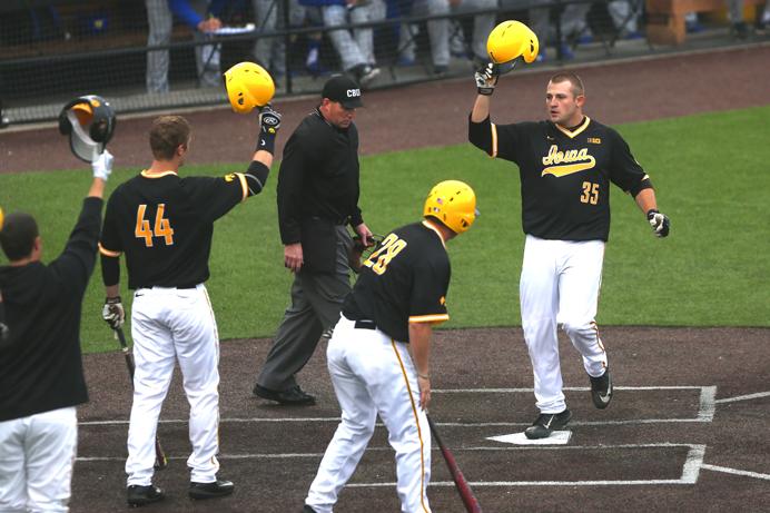Iowa+first+baseman+Jake+Adams+celebrates+with+teammates+after+a+home+run+during+the+game+between+South+Dakota+State%2FIowa+at+Duane+Banks+Field+on+Tuesday%2C+April+4%2C+2017.+The+Hawkeyes+scored+two+runs+in+the+bottom+of+the+seventh+to+top+the+Jackrabbits+4-3.+%28The+Daily+Iowan%2F+Alex+Kroeze%29