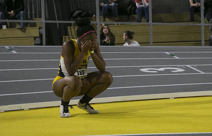 Iowa junior Brittany Brown reacts after the 200 meter priemer during a track meet in the Iowa Recreation Building on Friday, Jan. 27, 2017. The Hawkeyes hosted Wisconsin, Illinois State, Loyola and Notre Dame on the first day of the Black and Gold Premier. (The Daily Iowan/Joseph Cress)