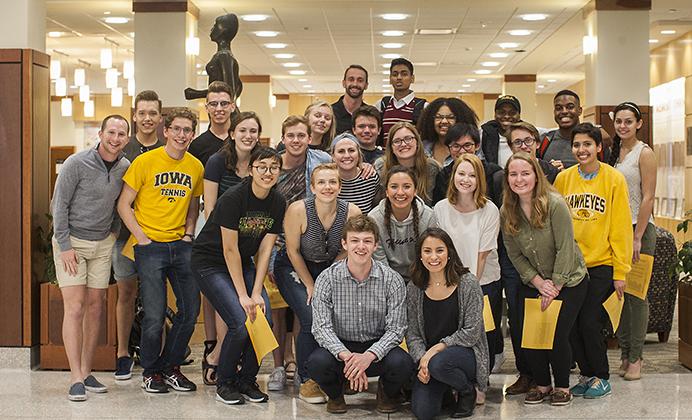 The newly elected UISG members pose for a photo inside the IMU on Friday, April 14. Jacob Simpson and Lilian Sanchez won the presidential ticket for Bridge UI along with 38 senators. (The Daily Iowan/Ben Smith)