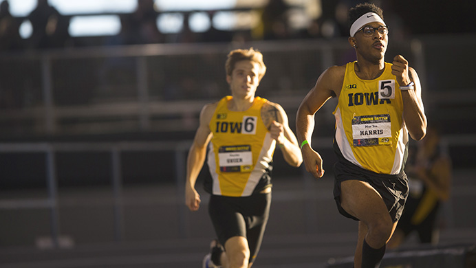 Iowa sophomore Maryea Harris, front, and Charles Guier compete during the mens 600 meter during the Border Battle indoor track meet in the UI Recreation Building with Iowa, Missouri and Illinois competing on Saturday, Jan. 7, 2017. The Hawkeye women defeated Missouri and Illinois, 105-33 and 96-51 respectively, while the men defeated Missouri, 107-27 and fell to Illinois, 85-74. (The Daily Iowan/Joseph Cress)