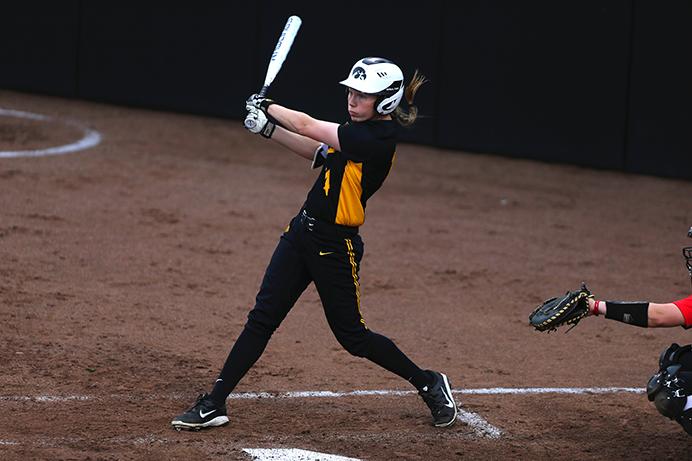 Iowa+first+baseman+Kaitlyn+Mullarkey+watches+the+ball+after+her+hit+during+the+meeting+between+Rutgers-Iowa+at+Bob+Pearl+Softball+Filed+on+Friday%2C+April+14%2C+2017.+The+Hawkeyes+went+on+to+defeat+the+Scarlet+Knights+in+the+first+game+of+the+weekend+series+2-0.+%28The+Daily+Iowan%2F+Alex+Kroeze%29