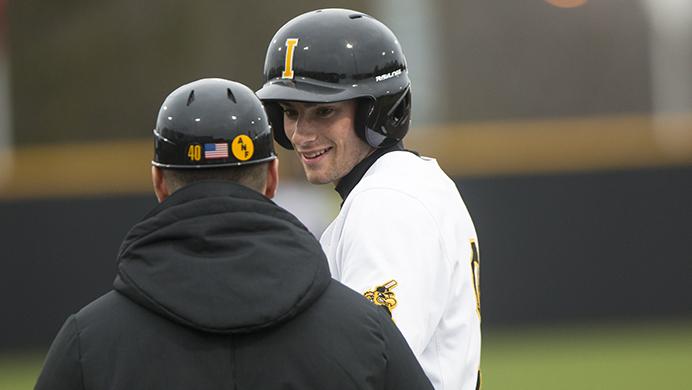 Iowa+outfielder+Ben+Norman+talks+with+volunteer+assistant+coach+Sean+Moore+during+the+first+of+three+baseball+games+against+UNLV+at+Duane+Banks+Field+on+Friday%2C+March%2C+31%2C+2017.+The+Hawkeyes+defeated+the+Rebels%2C+3-0.+%28The+Daily+Iowan%2FJoseph+Cress%29