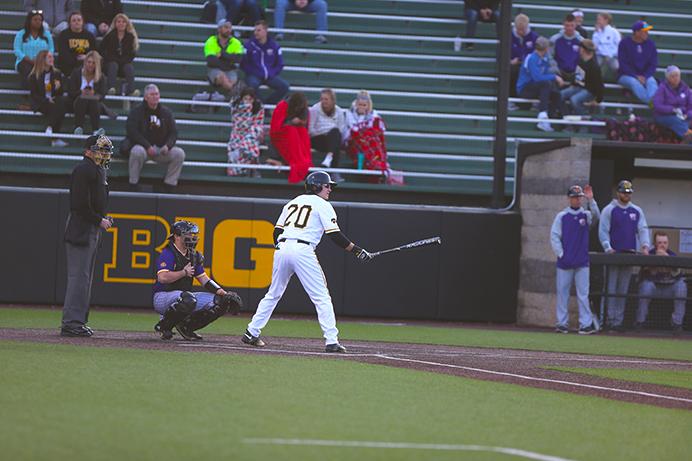 Iowa designated hitter Austin Guzzo steps into the batter box during the game between Western Illinois-Iowa in Iowa City at Duane Banks Field on Tuesday, April 11, 2017. The Hawkeyes defeated the Leathernecks 4-1. (The Daily Iowan/ Alex Kroeze)
