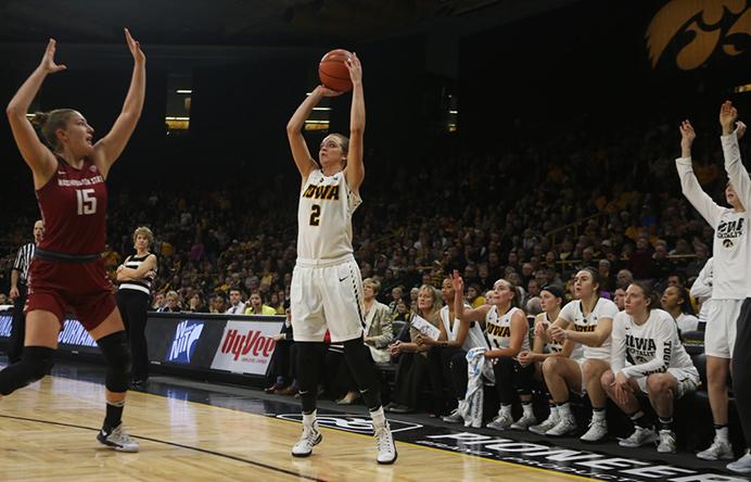 Iowa guard Ally Disterhoft takes a three point shot during the quarterfinal game of the Womens NIT between Washington State and Iowa at Carver Hawkeye Arena in Iowa City on Sunday, March 26, 2017. The Cougars went on to defeat the Hawkeyes 74-66. (The Daily Iowan/ Alex Kroeze)