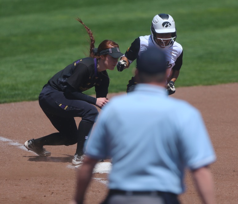 Iowa infielder Lea Thompson celebrates sliding into third base during the game between Iowa/Northwestern at Pearl Field on Sunday, May 7, 2017. On Iowas senior day they fell to the Wildcats 5-2. (The Daily Iowan/ Alex Kroeze)