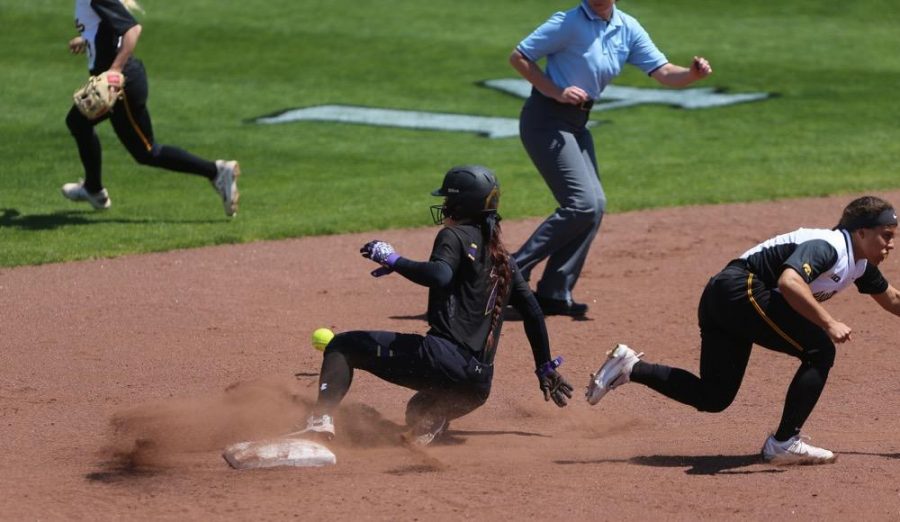 Northwestern infielder Morgan Nelson slides into second base during the game between Iowa/Northwestern at Pearl Field on Sunday, May 7, 2017. On Iowas senior day they fell to the Wildcats 5-2. (The Daily Iowan/ Alex Kroeze)