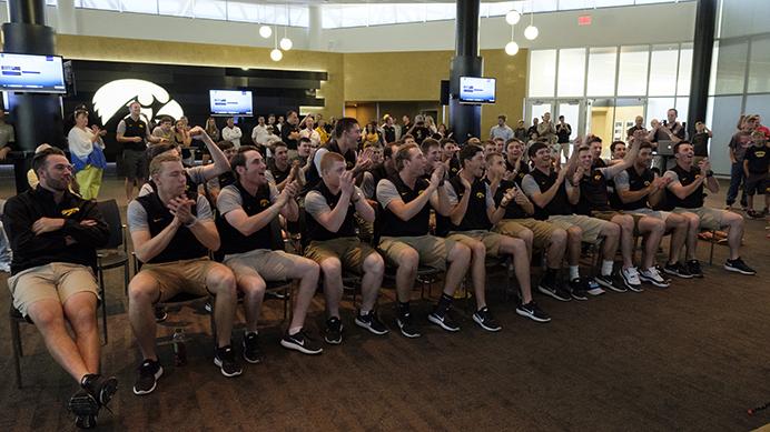 The Iowa Baseball team reacts to the announcement of their NCAA Tournament seed in the Feller Room at Carver-Hawkeye arena on Monday May 29, 2017. The Hawkeyes earned an automatic bid by winning their first ever Big Ten Tournament. They were awarded a 4 seed and will play in the Houston Regional starting on June 2 against host Houston. The game will be televised on ESPNU at 7p.m. (The Daily Iowan/Nick Rohlman)