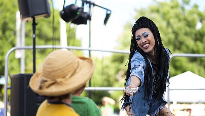 Drag Queen Ophelia Belle performs during the Iowa City Downtown District Block Party on Saturday June 25, 2017. The Block Party, hosted by the ICDD was the first use of Iowa City's changed rules allowing open containers for select events downtown. Open containers were permitted only for beer or wine in the approved glasses. (Nick Rohlman/The Daily Iowan)