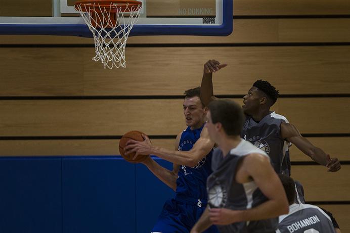 Iowa's Jack Nunge grabs a rebound during a Prime Time League basketball game in the Cedar Valley SportsPlex in Waterloo on  Thursday, June 29, 2017. Nunge had 11 rebounds and 23 points. (Joseph Cress/The Daily Iowan)