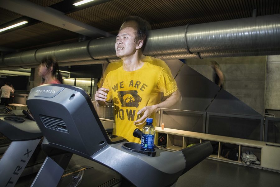 University of Iowa student, Zhong Ren, goes for his regular one hour run at the Campus Recreation and Wellness Center on Monday, June 19, 2017. Zhong is originally from Chongqing, in central China, and is currently attending University of Iowa PhD Engineering Program. (James Year/The Daily Iowan