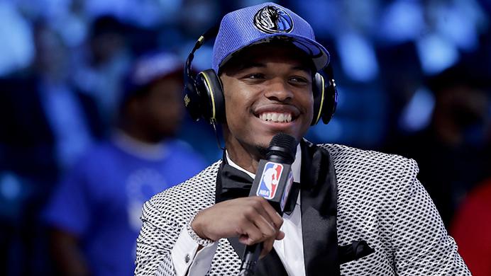 Dennis Smith Jr. answers questions during an interview after being selected by the Dallas Mavericks as the ninth pick overall during the NBA basketball draft, Thursday, June 22, 2017, in New York. (AP Photo/Frank Franklin II)