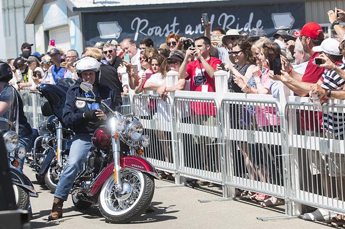 Vice President Mike Pence arrives on a Harley-Davidson motorcycle before giving his speech during Joni Ernsts third annual Roast and Ride event in Boone, Iowa, on Saturday, June 3, 2017. Guests included Vice President Mike Pence; Sen. Tim Scott, R-S.C.; Sen. Chuck Grassley, R-Iowa; Iowa Gov. Kim Reynolds; and Rep. Steve King, R-Iowa. (The Daily Iowan/Joseph Cress)