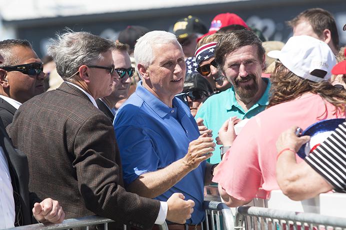 Vice President Mike Pence shakes hands with supporters  during Joni Ernsts third annual Roast and Ride event in Boone, Iowa, on Saturday, June 3, 2017. Guests included Vice President Mike Pence; Sen. Tim Scott, R-S.C.; Sen. Chuck Grassley, R-Iowa; Iowa Gov. Kim Reynolds; and Rep. Steve King, R-Iowa. (The Daily Iowan/Joseph Cress)