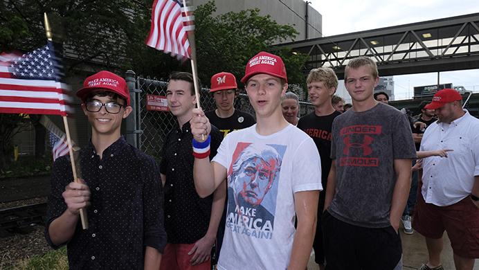 Trump supporters wait in line outside of a Donald Trump rally in Cedar Rapids on Wednesday June 21, 2017. (Nick Rohlman/The Daily Iowan)