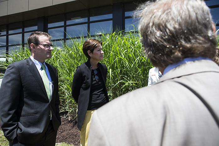 Iowa Lt. Gov. Adam Gregg, left, and Iowa Gov. Kim Reynolds listen to information about a miscanthus grass during a visit on the University of Iowa campus to learn about diversifying biomass fuel sources on at the Cambus Maintenance Facility on Wednesday, June, 7, 2017. Iowa Gov. Kim Reynolds and Lt. Gov. Adam Gregg met with University of Iowa President J. Bruce Harreld and other university experts on their visit while discussing the universitys biomass portfolio. (The Daily Iowan/Joseph Cress)