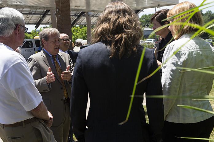 University of Iowa President J. Bruce Harreld speaks to a group during a visit on the University of Iowa campus to learn about diversifying biomass fuel sources on at the Cambus Maintenance Facility on Wednesday, June, 7, 2017. Iowa Gov. Kim Reynolds and Lt. Gov. Adam Gregg met with University of Iowa President J. Bruce Harreld and other university experts on their visit while discussing the universitys biomass portfolio. (The Daily Iowan/Joseph Cress)
