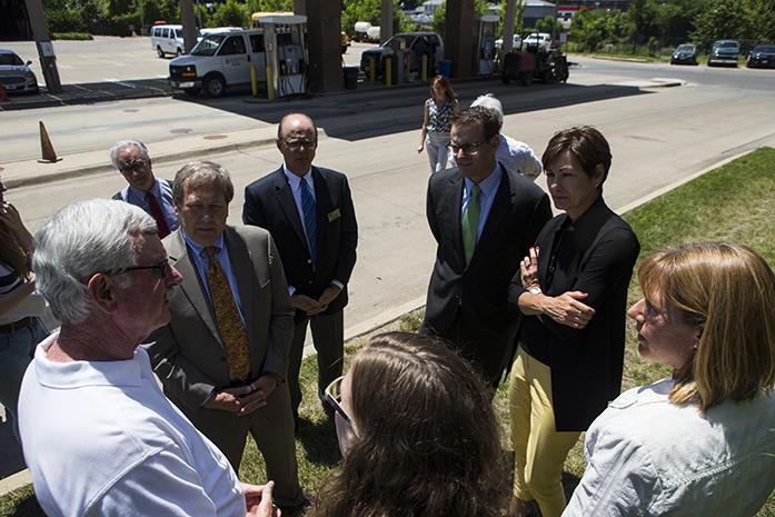 University of Iowa President J. Bruce Harreld, Lt. Gov. Adam Gregg, and Iowa Gov. Kim Reynolds listen to information about a miscanthus grass during a visit on the University of Iowa campus to learn about diversifying biomass fuel sources on at the Cambus Maintenance Facility on Wednesday, June, 7, 2017. Iowa Gov. Kim Reynolds and Lt. Gov. Adam Gregg met with University of Iowa President J. Bruce Harreld and other university experts on their visit while discussing the universitys biomass portfolio. (The Daily Iowan/Joseph Cress)
