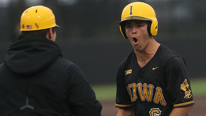 FILE+-+Iowa+center+fielder+Justin+Jenkins+celebrates+his+single+with+an+RBI+during+game+two+of+the+Iowa-Purdue+series+at+Duane+Banks+Stadium+on+Saturday%2C+March+25%2C+2017.+The+native+of+Terra+Haute%2C+Indiana%2C+plays+in+the+Prospects+Summer+League+for+his+hometown+Terra+Haute+Rex.+%28Margaret+Kispert%2FThe+Daily+Iowan%2C+file%29