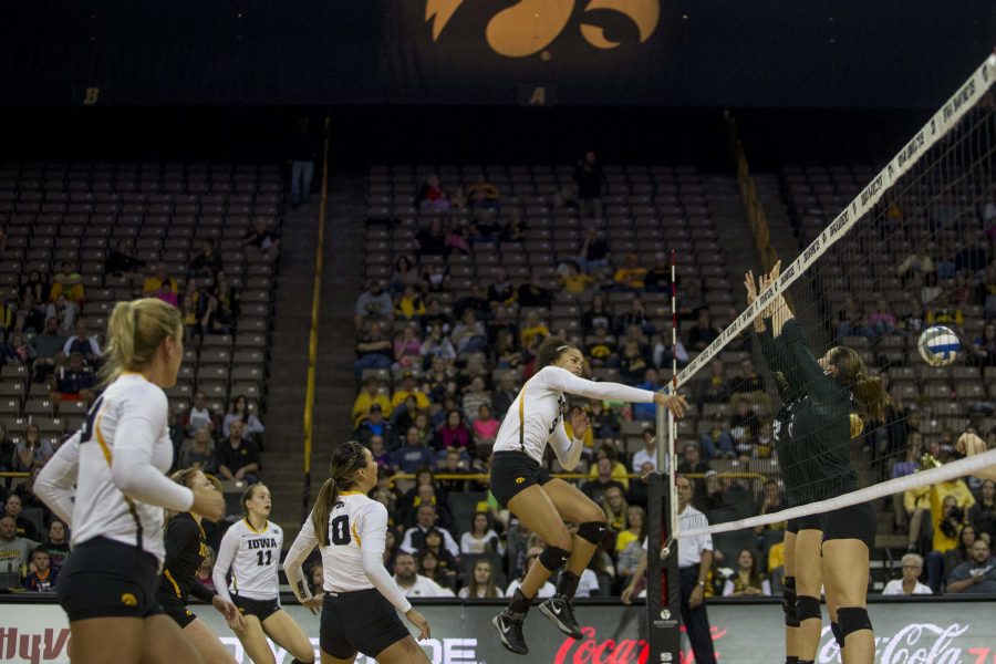 FILE+-+In+this+file+photo%2C+Iowa+middle+blocker+Ashley+Mariani+penetrates+Michigan+States+defense+at+Carver-Hawkeye+Arena+on+Saturday%2C+Oct.+10%2C+2015.+%28The+Daily+Iowan%2FPeter+Kim%2C+file%29